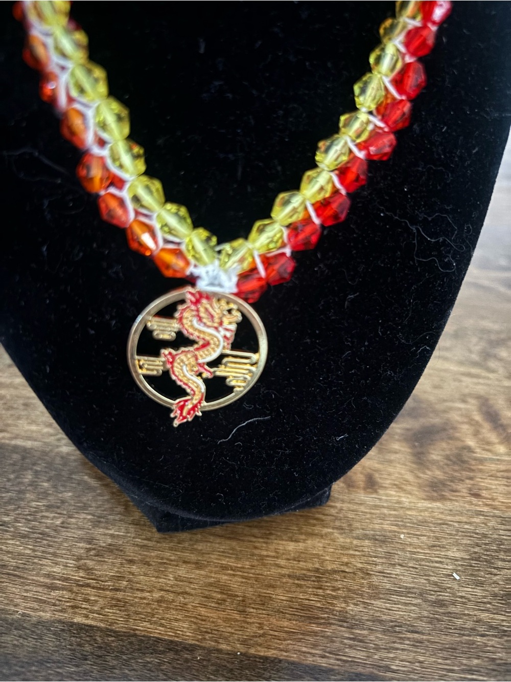 Red and Yellow Beaded Necklace with Gold Dragon Pendant
